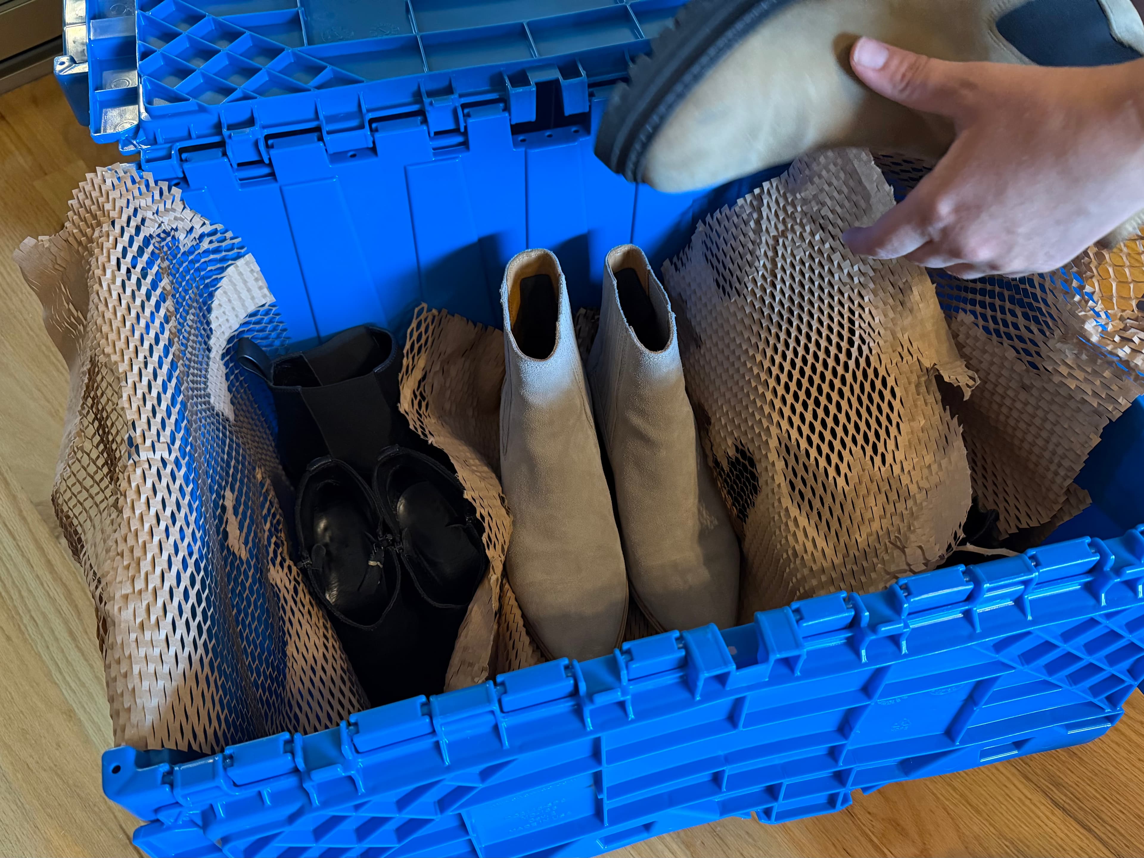 Closet contents packed into totes